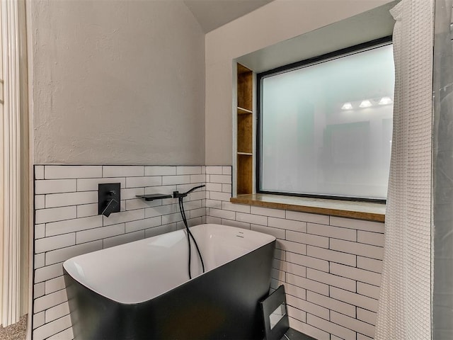 2724 SE 97th St, Oklahoma City, OK 73160 - full bath with a freestanding bath and tile walls
