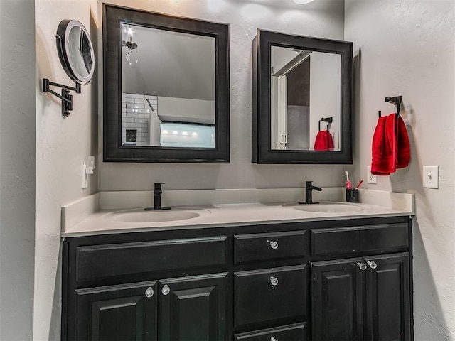 2724 SE 97th St, Oklahoma City, OK 73160 - bathroom with double vanity and a textured wall