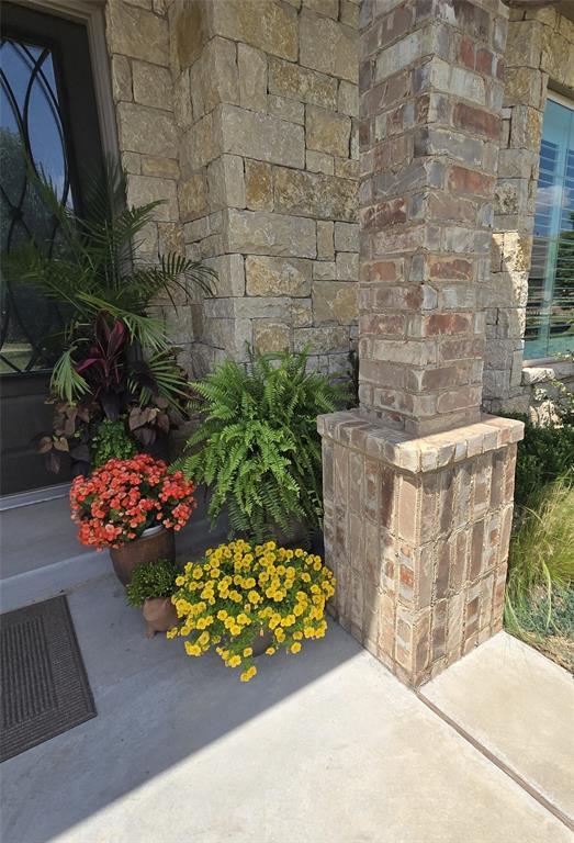 9252 Elaine Dr, Midwest City, OK 73130 - exterior view of stone siding