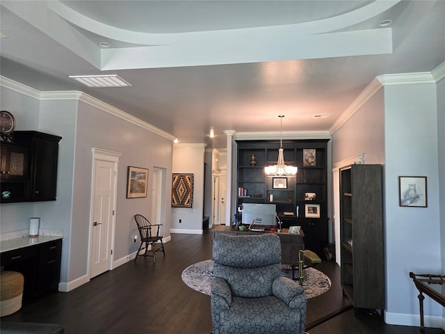 9252 Elaine Dr, Midwest City, OK 73130 - living area with dark wood-style flooring, an office area, a raised ceiling, crown molding, and built in features