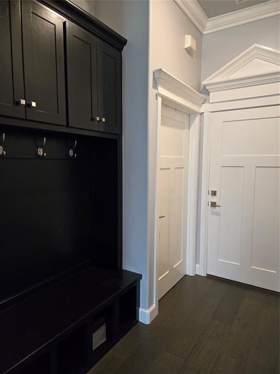9252 Elaine Dr, Midwest City, OK 73130 - mudroom with ornamental molding and dark wood finished floors