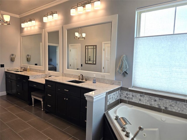9252 Elaine Dr, Midwest City, OK 73130 - bathroom featuring plenty of natural light, a chandelier, crown molding, vanity, and a jetted tub