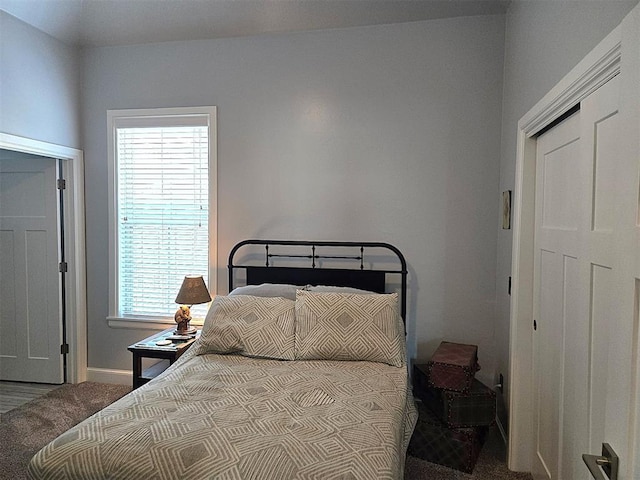9252 Elaine Dr, Midwest City, OK 73130 - bedroom with baseboards and carpet floors