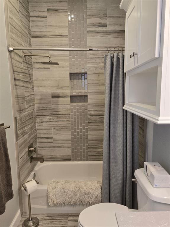 9252 Elaine Dr, Midwest City, OK 73130 - bathroom featuring toilet and shower / tub combo with curtain