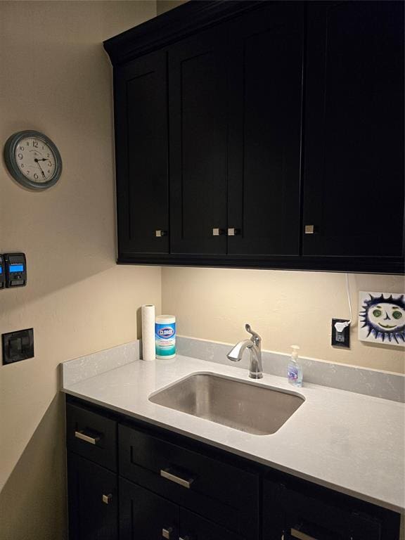 9252 Elaine Dr, Midwest City, OK 73130 - kitchen featuring dark cabinets and light countertops