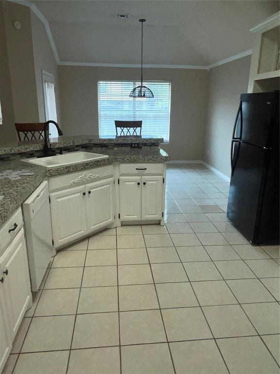 5725 SE 86th St, Oklahoma City, OK 73135 - kitchen with freestanding refrigerator, lofted ceiling, white dishwasher, crown molding, and light tile patterned flooring