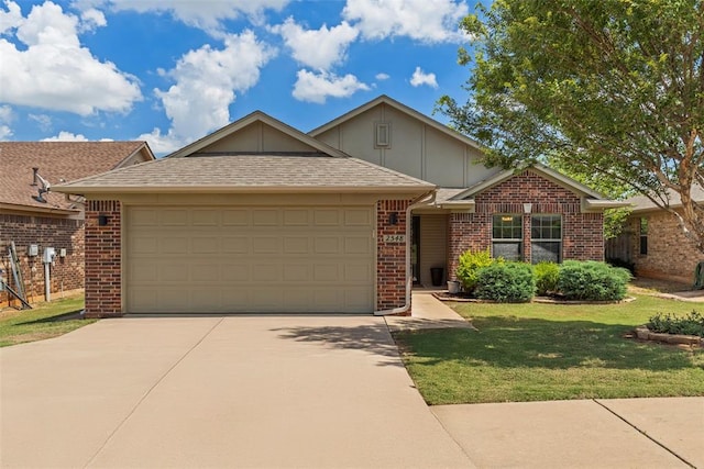 2548 NW 184th St, Edmond, OK 73012 - ranch-style home with concrete driveway, brick siding, a garage, and board and batten siding
