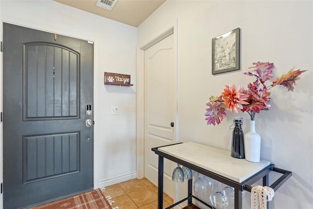 2548 NW 184th St, Edmond, OK 73012 - foyer featuring baseboards and light tile patterned floors
