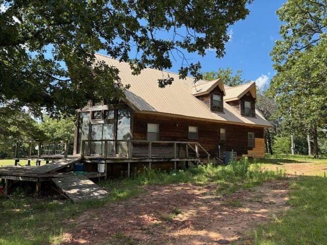 11825 N 3660th Rd, Cromwell, OK 74884 - rear view of property with a metal roof