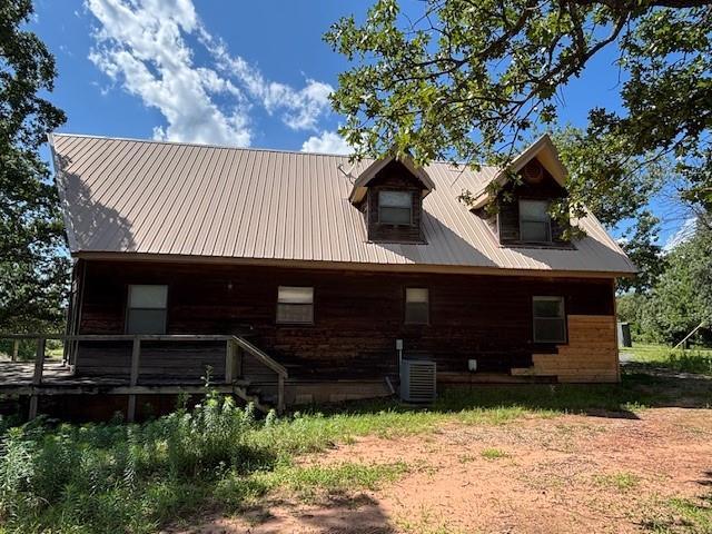 11825 N 3660th Rd, Cromwell, OK 74884 - rear view of house featuring a metal roof