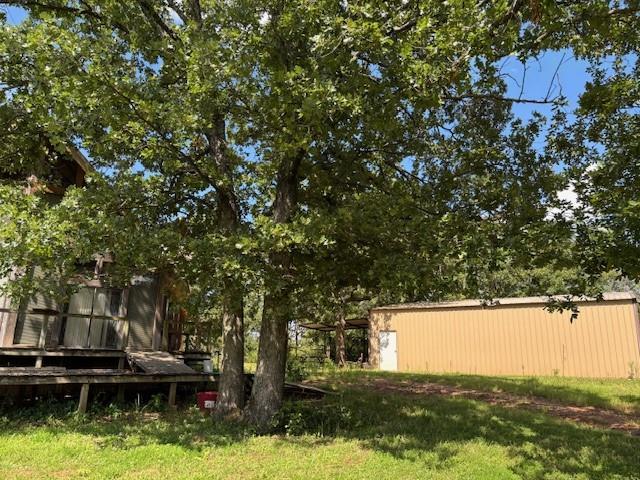 11825 N 3660th Rd, Cromwell, OK 74884 - view of green lawn featuring an outbuilding