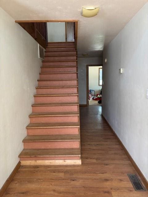 11825 N 3660th Rd, Cromwell, OK 74884 - stairway with wood finished floors and baseboards