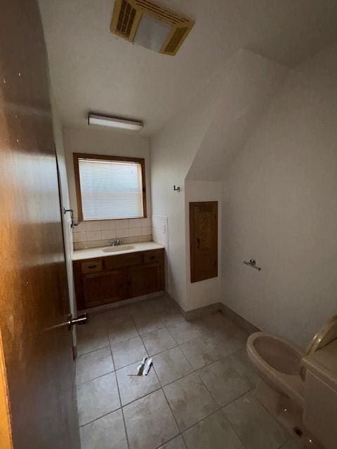 11825 N 3660th Rd, Cromwell, OK 74884 - bathroom with vanity, backsplash, and tile patterned flooring