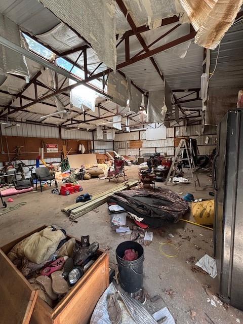 11825 N 3660th Rd, Cromwell, OK 74884 - garage featuring freestanding refrigerator