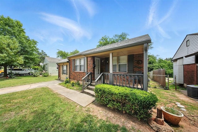 3534 Garden Pl, Oklahoma City, OK 73112 - bungalow-style home featuring brick siding and covered porch