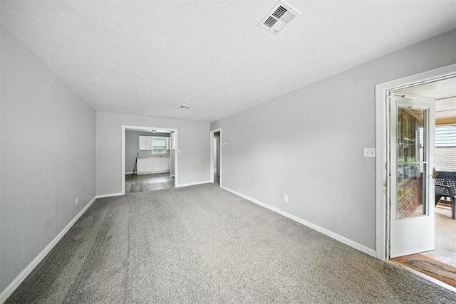 3534 Garden Pl, Oklahoma City, OK 73112 - carpeted spare room featuring plenty of natural light