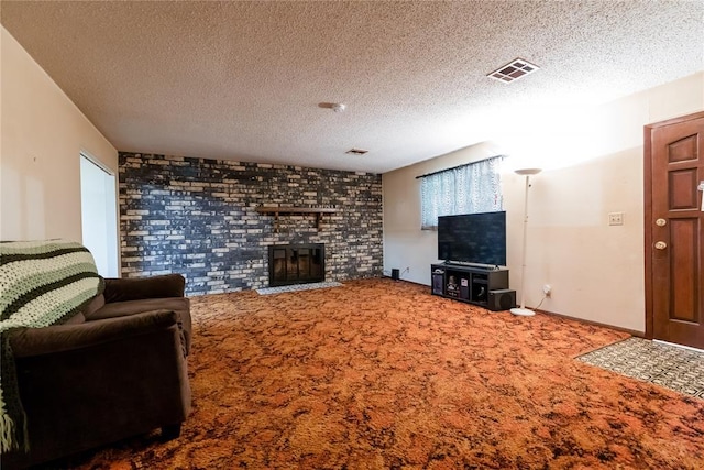 1319 N Cook, Cordell, OK 73632 - living room with carpet flooring, a fireplace, and a textured ceiling