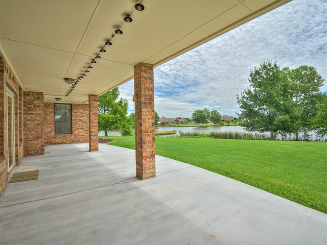 3004 Twin Lake Dr, Moore, OK 73165 - view of patio / terrace with a water view