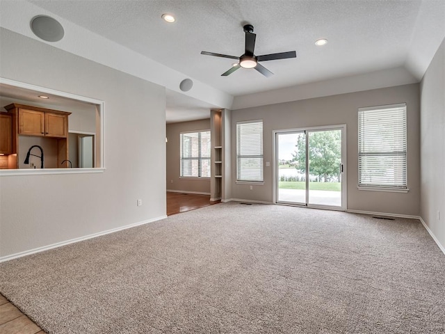 3004 Twin Lake Dr, Moore, OK 73165 - spare room featuring light colored carpet, a ceiling fan, recessed lighting, and a textured ceiling