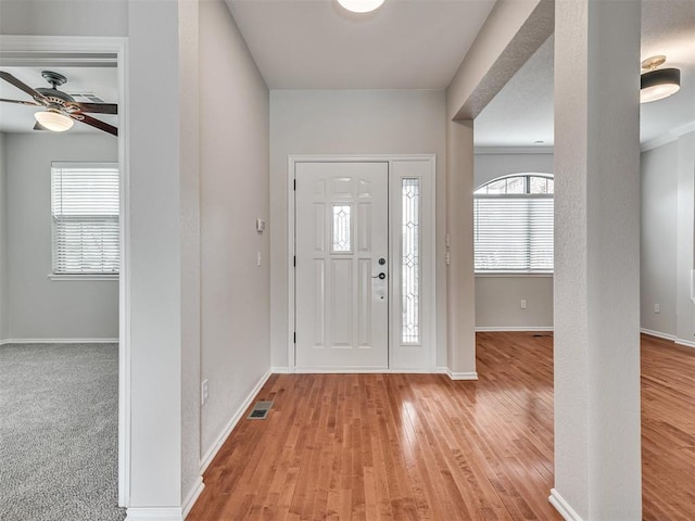 3004 Twin Lake Dr, Moore, OK 73165 - foyer with a ceiling fan and wood finished floors