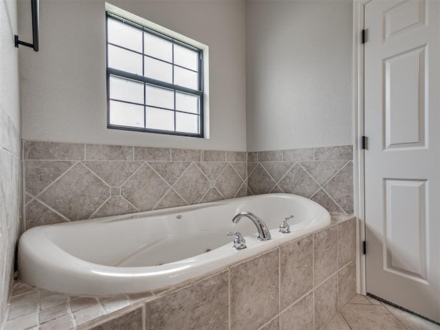 3004 Twin Lake Dr, Moore, OK 73165 - bathroom featuring a garden tub and tile patterned floors