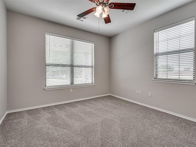 3004 Twin Lake Dr, Moore, OK 73165 - carpeted empty room with a ceiling fan and baseboards