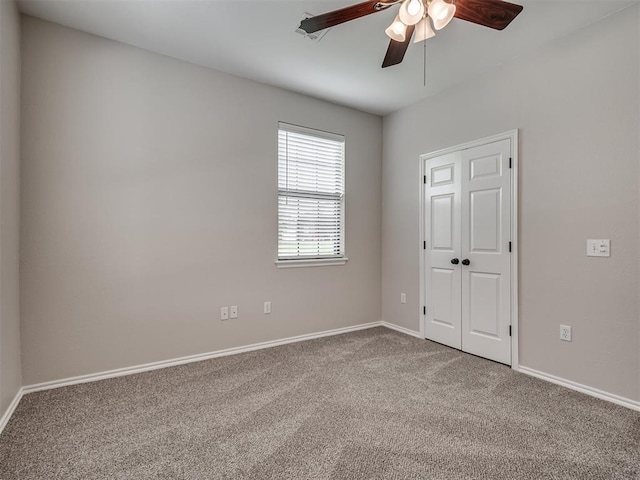 3004 Twin Lake Dr, Moore, OK 73165 - unfurnished bedroom with carpet floors and ceiling fan
