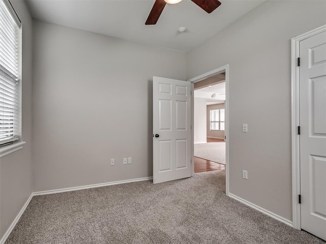 3004 Twin Lake Dr, Moore, OK 73165 - spare room with a ceiling fan, carpet flooring, and a smoke detector