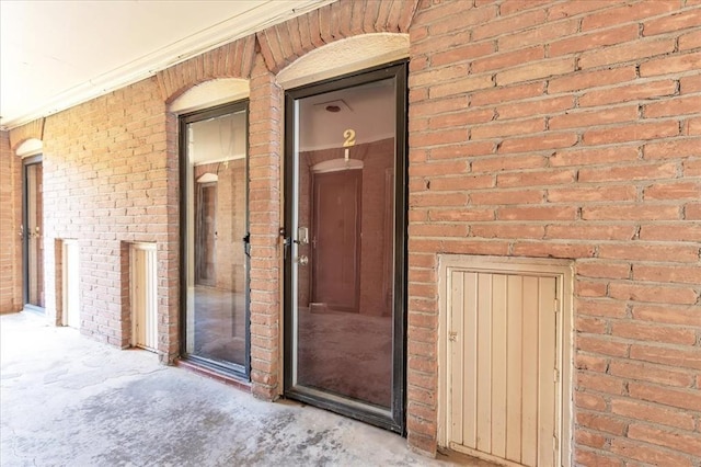 6100 N Brookline Ave Unit 2, Oklahoma City, OK 73112 - view of exterior entry with brick siding