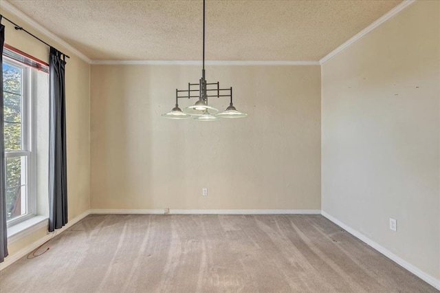 6100 N Brookline Ave Unit 2, Oklahoma City, OK 73112 - unfurnished dining area featuring a textured ceiling, crown molding, and light carpet