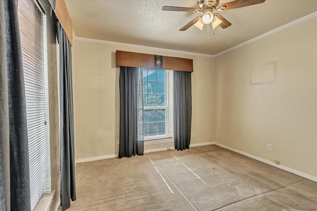 6100 N Brookline Ave Unit 2, Oklahoma City, OK 73112 - carpeted spare room with ceiling fan, ornamental molding, and a textured ceiling