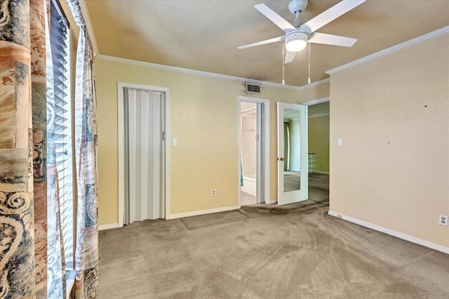 6100 N Brookline Ave Unit 2, Oklahoma City, OK 73112 - unfurnished room featuring ceiling fan, carpet floors, and crown molding