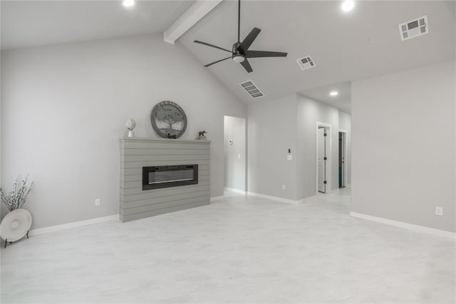 219 SE 45th St, Oklahoma City, OK 73129 - unfurnished living room with a ceiling fan, beamed ceiling, a glass covered fireplace, recessed lighting, and high vaulted ceiling