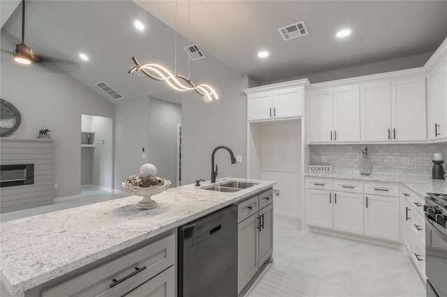 219 SE 45th St, Oklahoma City, OK 73129 - kitchen with dishwasher, vaulted ceiling, decorative backsplash, light stone countertops, and white cabinets