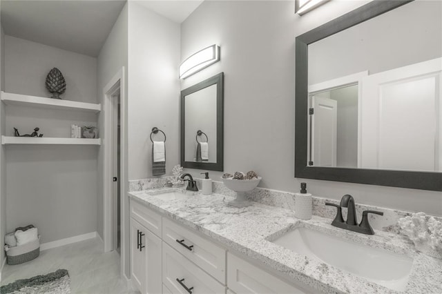 219 SE 45th St, Oklahoma City, OK 73129 - full bathroom with double vanity and tile patterned flooring