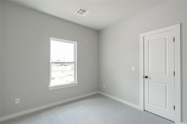 219 SE 45th St, Oklahoma City, OK 73129 - unfurnished room featuring light carpet