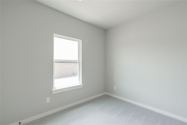 219 SE 45th St, Oklahoma City, OK 73129 - unfurnished room with light colored carpet and baseboards