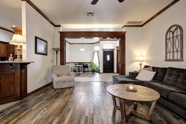 10633 NW 38th St, Yukon, OK 73099 - living room with ornamental molding, wood finished floors, and ceiling fan