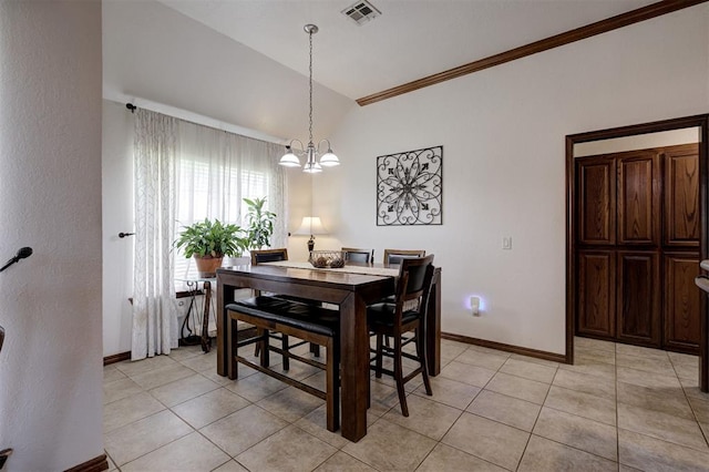 10633 NW 38th St, Yukon, OK 73099 - dining space with vaulted ceiling, a chandelier, light tile patterned floors, and crown molding