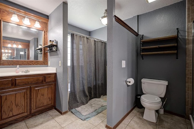 10633 NW 38th St, Yukon, OK 73099 - full bathroom with vanity, tile patterned flooring, a textured wall, and a shower with curtain