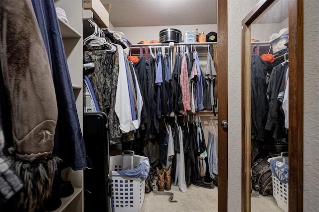 10633 NW 38th St, Yukon, OK 73099 - walk in closet featuring carpet flooring