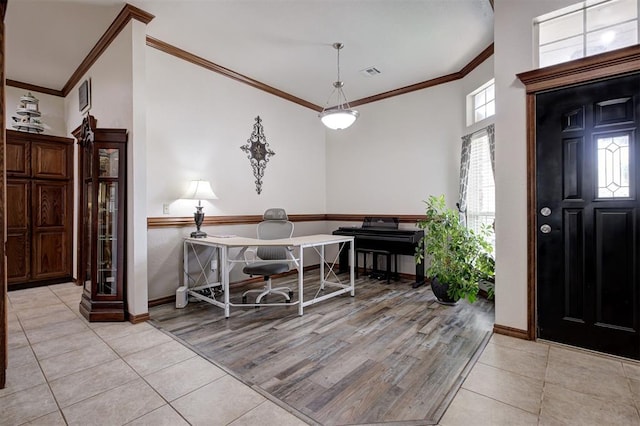 10633 NW 38th St, Yukon, OK 73099 - entrance foyer with light tile patterned floors and crown molding