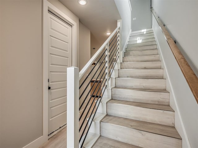 609 W 2nd St, Edmond, OK 73003 - stairs with wood finished floors and recessed lighting