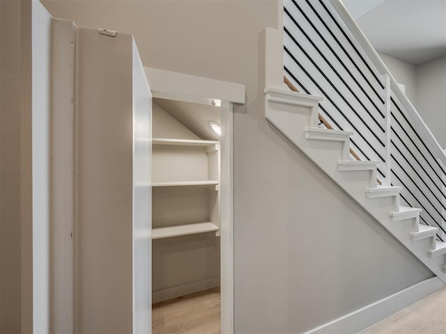 609 W 2nd St, Edmond, OK 73003 - staircase featuring wood finished floors