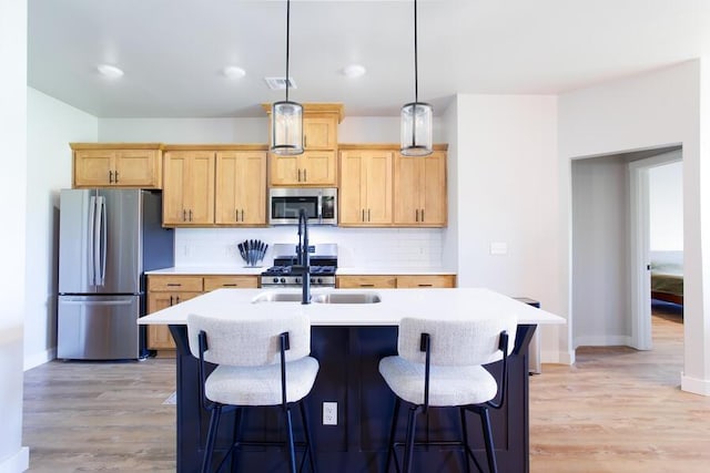 9228 NW 144th Pl, Yukon, OK 73099 - kitchen featuring stainless steel appliances, light brown cabinetry, light countertops, backsplash, and recessed lighting