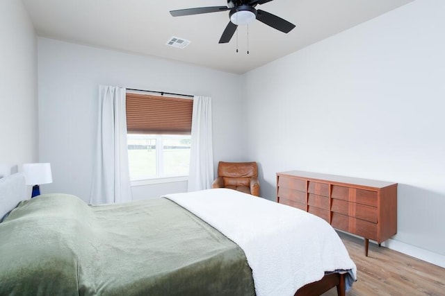 9228 NW 144th Pl, Yukon, OK 73099 - bedroom featuring light wood-type flooring and a ceiling fan