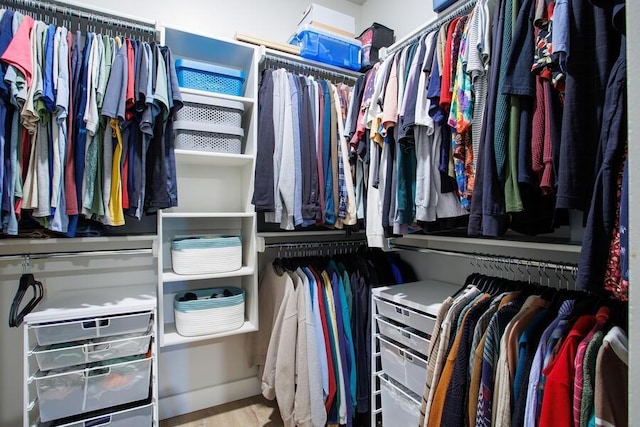 9228 NW 144th Pl, Yukon, OK 73099 - walk in closet with wood finished floors