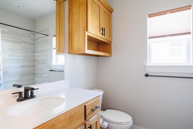 9228 NW 144th Pl, Yukon, OK 73099 - full bathroom featuring healthy amount of natural light, vanity, and a shower