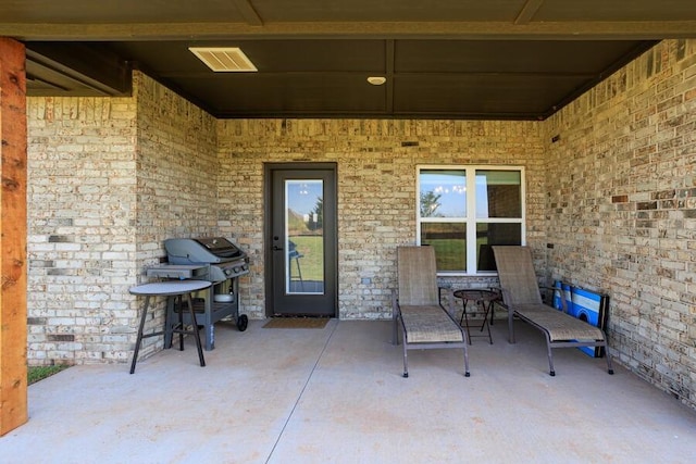 9228 NW 144th Pl, Yukon, OK 73099 - view of patio featuring area for grilling