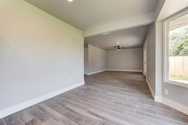 1317 E Boyd St, Norman, OK 73071 - spare room featuring light wood-style flooring, ceiling fan, and recessed lighting